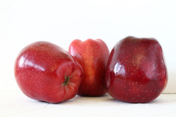 Fototapeta na wymiar three Fresh red apples on white background