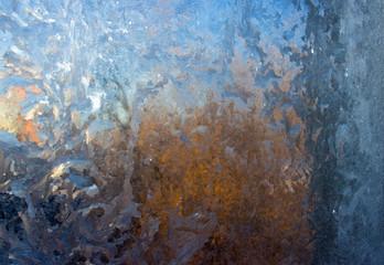 stains of frozen water vapor on the window