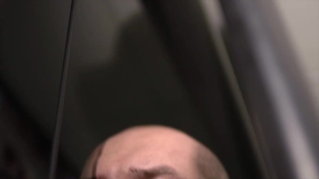 the face of the man who is engaged in the simulator