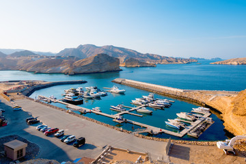 Small marina at Muscat, Oman. - obrazy, fototapety, plakaty