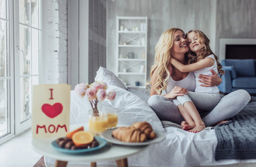Mom and daughter at home