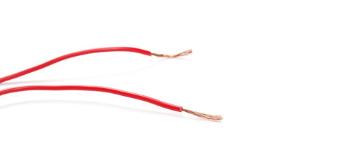 Black and red damaged, cut insulated cable, wire isolated on white background