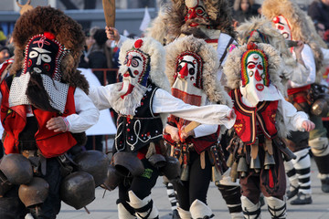 Kukeri, mummers perform rituals with costumes and big bells, intended to scare away evil spirits during the international festival  of masquerade games ”Surva” in Pernik. Foklore