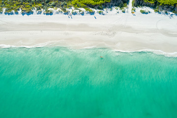aerial views of any white beach turquoise clear waters and lush dunes in Australia