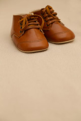 Brown leather baby shoes