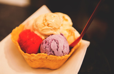 Fruit ice cream in a wafer basket