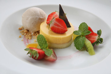 Vanilla dessert with ice cream and strawberries