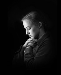 Young woman praying