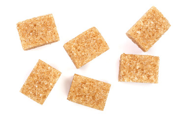 brown sugar cubes isolated on white background. Top view. Flat lay