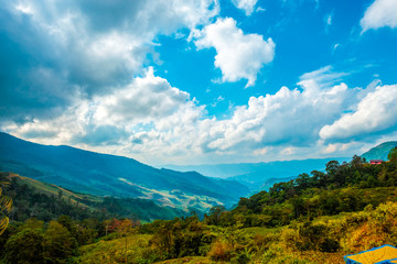 Naklejka premium high mountains peaks range clouds in fog scenery landscape national park view outdoor at Chiang Rai, Chiang Mai Province, Thailand