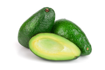 whole and half avocado isolated on white background close-up. Top view