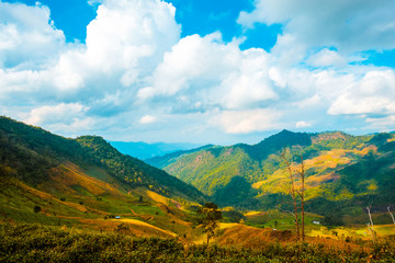 Fototapeta na wymiar high mountains peaks range clouds in fog scenery landscape national park view outdoor at Chiang Rai, Chiang Mai Province, Thailand