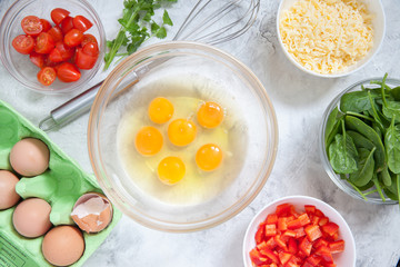 Fresh vegetables, eggs and cheese. Ingredients for healthy breakfast