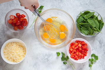 Fresh vegetables, eggs and cheese. Ingredients for healthy breakfast