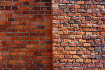 Red brick wall. The example of brickwork as exterior wall facing.