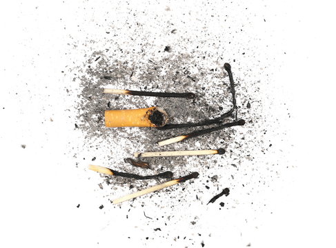 Cigarette stubs, burn matches and ash isolated on white background, top view