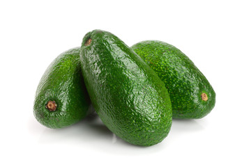 whole avocado isolated on white background close-up