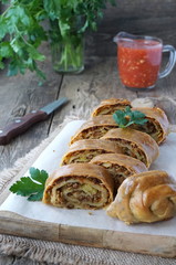 Strudel with meat, cabbage and potatoes
