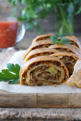 Strudel with meat, cabbage and potatoes