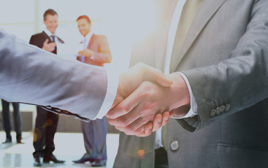 Close up of businessmen shaking hands