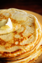 Pancakes with banana, nuts and honey. Traditional Russian cuisine. Maslenitsa. Dessert.