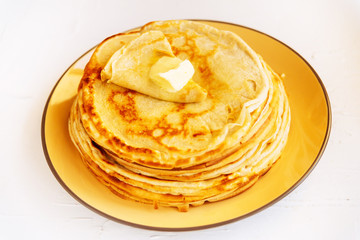 Russian traditional food. Appetizing fried pancakes during Pancake Week
