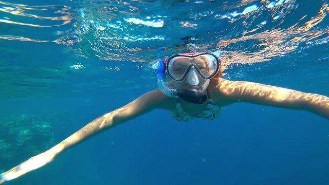 girl and snorkeling