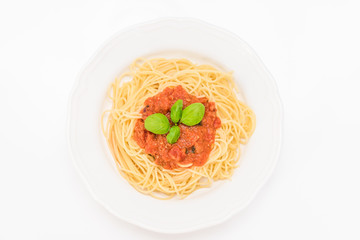 tatsty fresh spaghetti with tomato sauce fresh basil isolated on white background