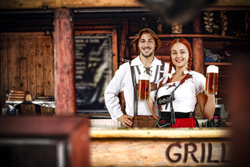 Young bavarian people and their own small business. Grill bar interior. 