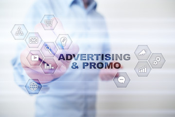 Avertising, marketing strategy. Icons and graphs on virtual screen. Business, internet and technology concept.