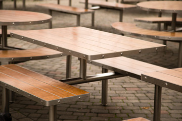 Obraz na płótnie Canvas Tables in a cafe in the park