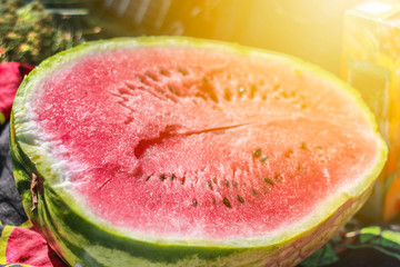 Half a watermelon on the store shelves, fruit vitamins