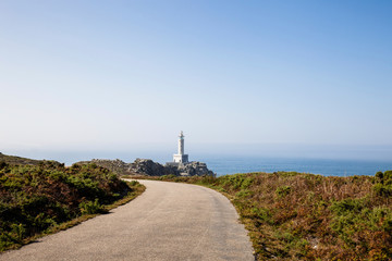 Fototapeta na wymiar Punta Nariga Lighthouse at sunny summer day