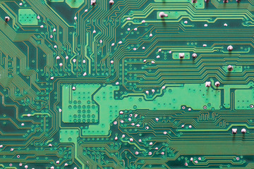 Green Computer motherboard surface of technology background.