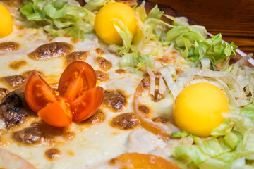 Hot delicious pizza freshly cooked in a cafe
