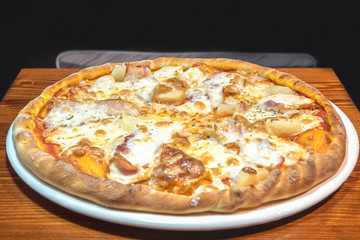 Hot delicious pizza freshly cooked in a cafe