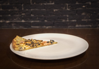 Hot delicious pizza freshly cooked in a cafe