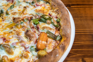 Hot delicious pizza freshly cooked in a cafe