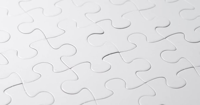 White puzzle in rotation