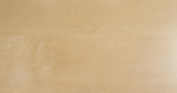Hand creasing paper into a ball