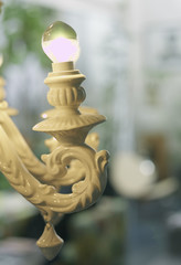 old style white chandelier detail