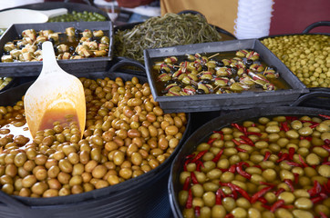 Varieties of many olives on a market in Valencia