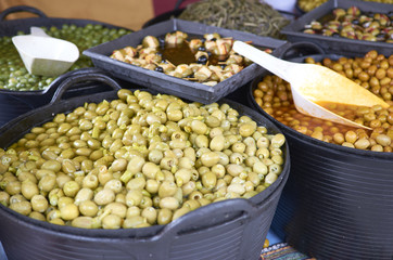 Varieties of many olives on a market in Valencia
