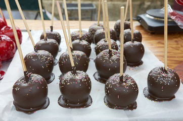 Red taffy Apples and melted chocolate covered apples