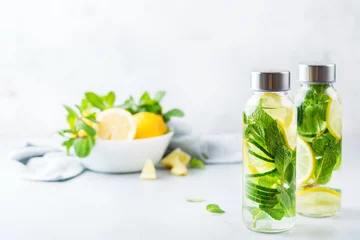 Deurstickers Fresh cool lemon cucumber mint infused water detox drink © aamulya
