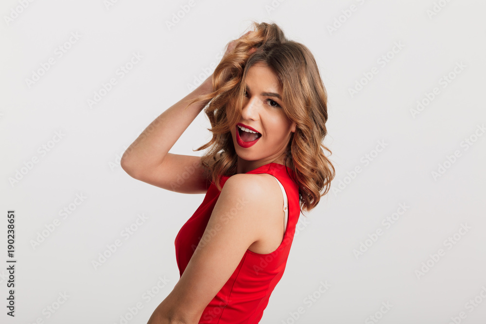 Sticker Portrait of a cheerful young girl dressed in red dress