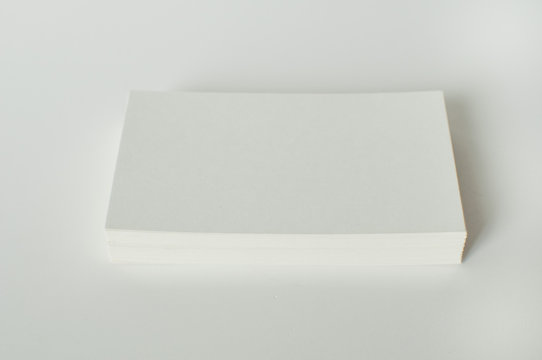 A stack of white blank calling cards