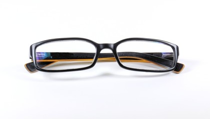 Black fashion reading glasses on white background.
