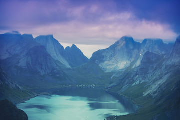 Beautiful nature at sunset light.  Aerial view of fjord and ridge from mount Reinebringen, Lofoten islands, Norway.