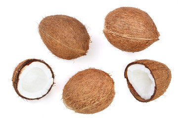 whole coconut with half isolated on white background. Flat lay. Top view